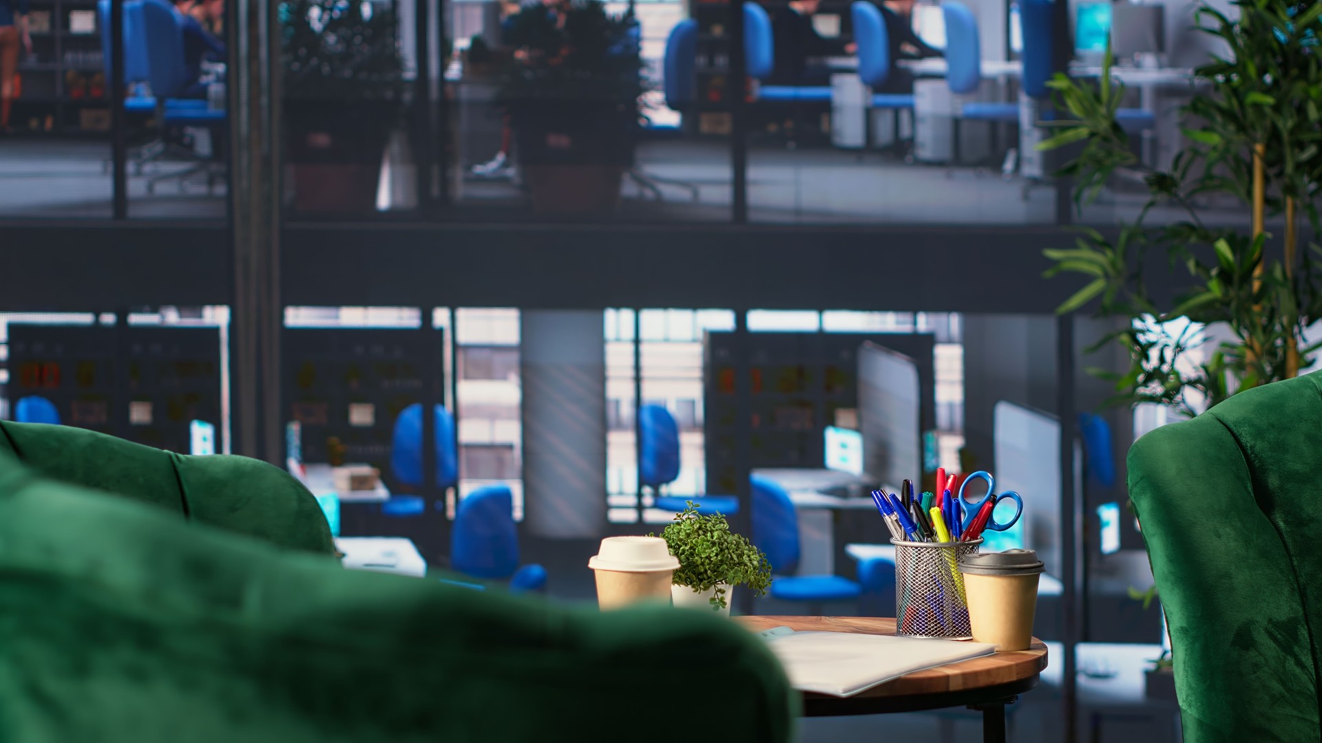 Empty office space showcases a monitor with financial data during meetings